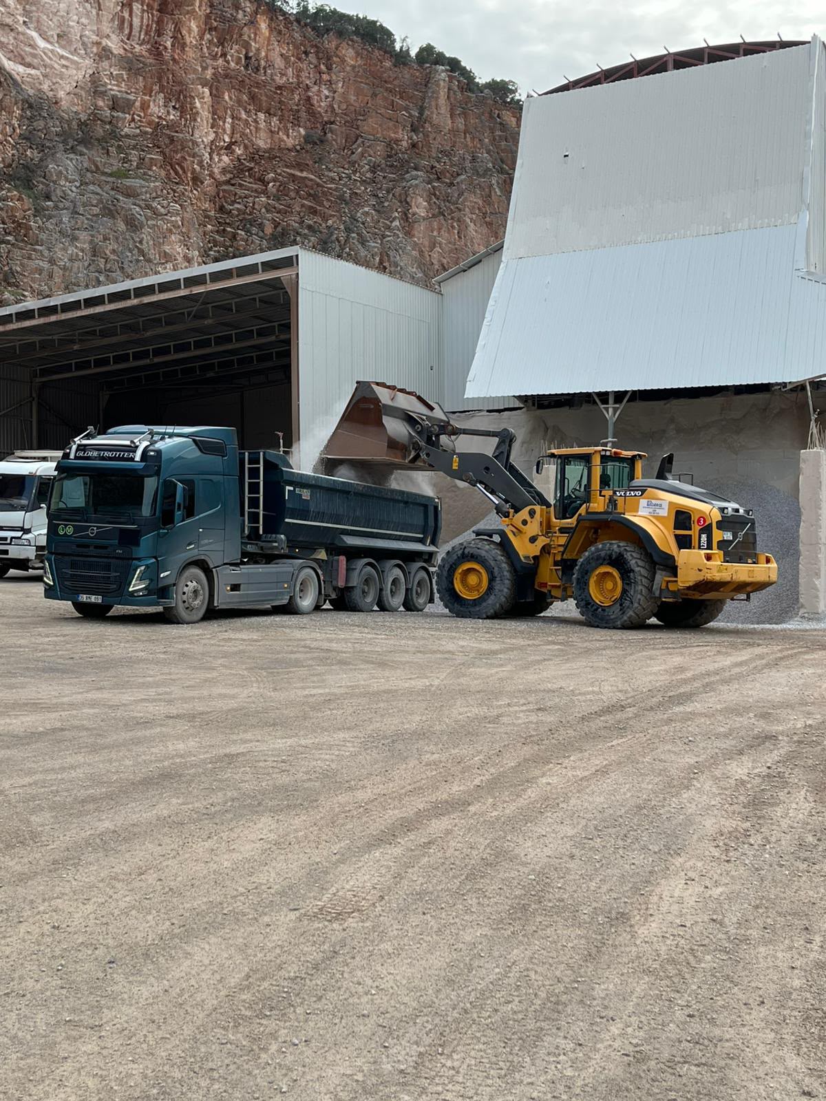 Bemaş wheel loader loading a truck in the equipment fleet